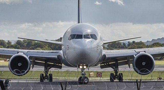 A large airplane sitting on the tarmac at an airport in Bogota, Colombia.