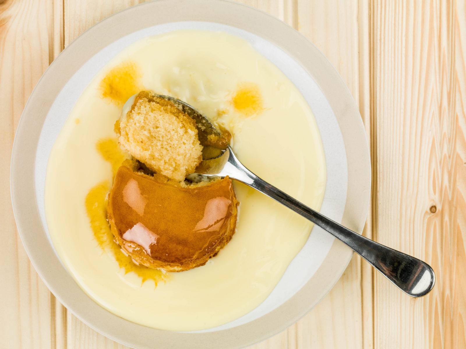 food in London England Syrup or Treacle Sponge Pudding With Custard
