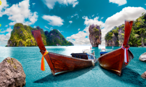 south Thailand itinerary | Island hoping Thailand | traditional wooden boats in Thailand