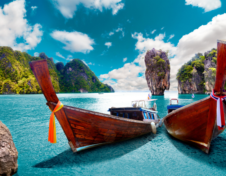 south Thailand itinerary | Island hoping Thailand | traditional wooden boats in Thailand