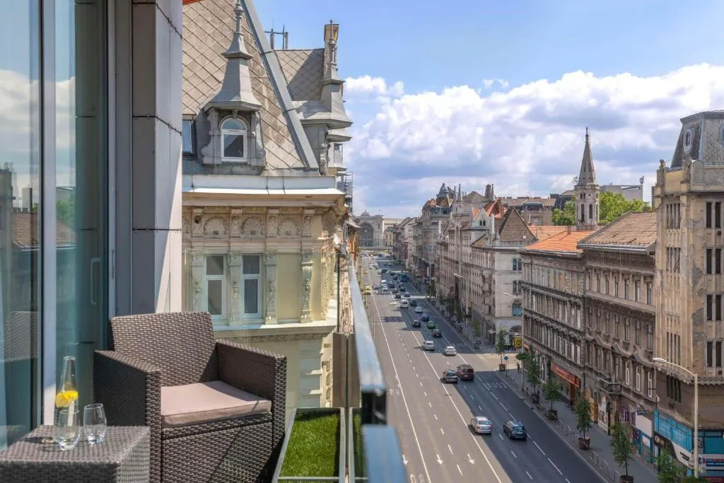 View from balcony overlooking bustling city street