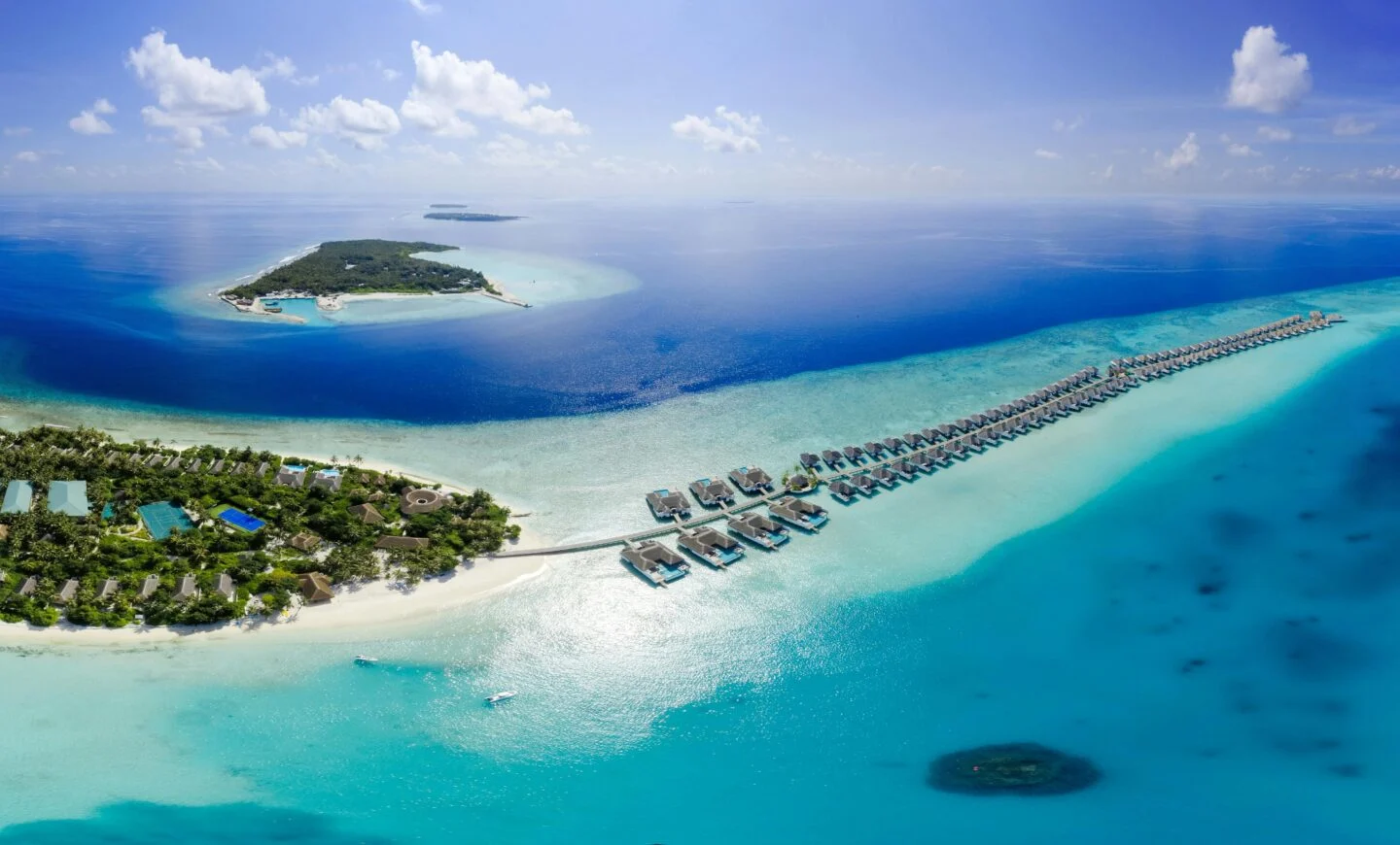 Aerial view of tropical island resort and blue ocean