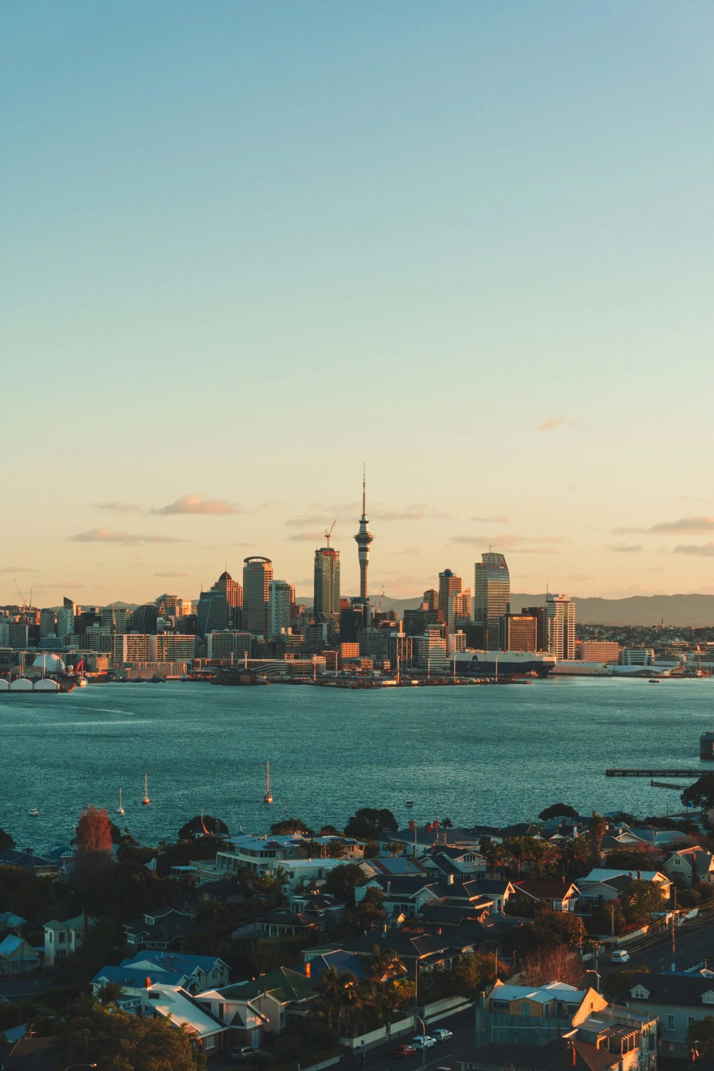 Sunset over Auckland city skyline and waterfront