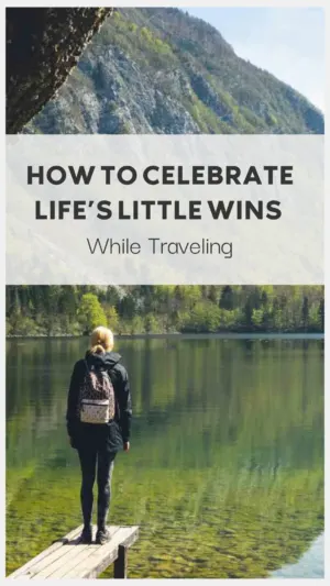 Woman celebrating quietly by a tranquil mountain lake