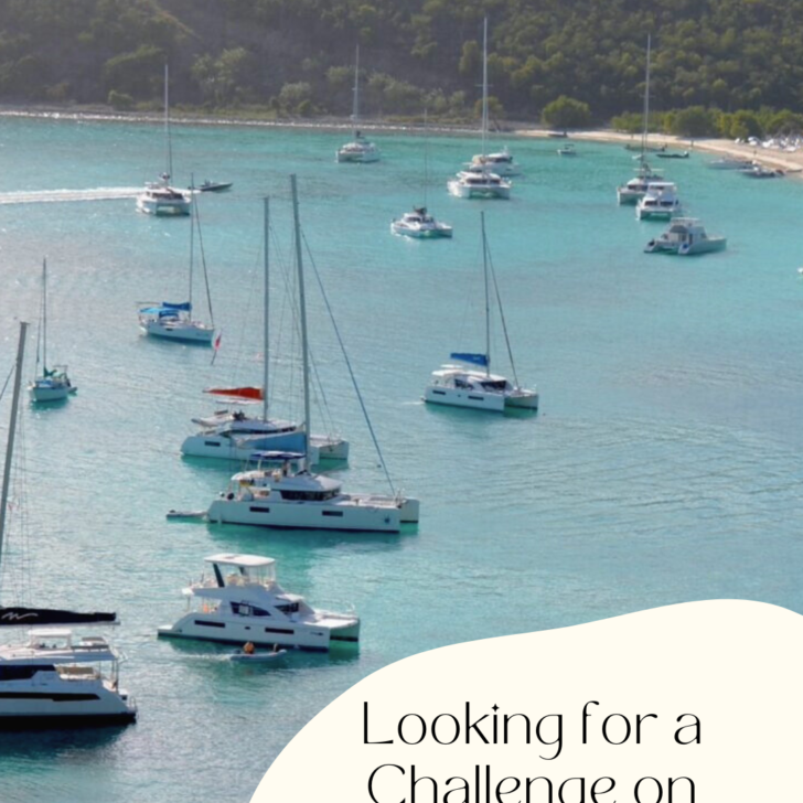 Yachts anchored in BVI, promoting solo sailing adventures.