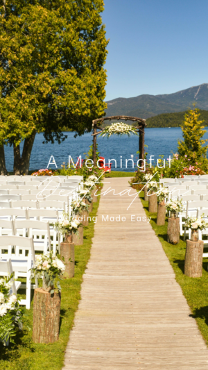 Outdoor wedding setup by lake with mountains in background