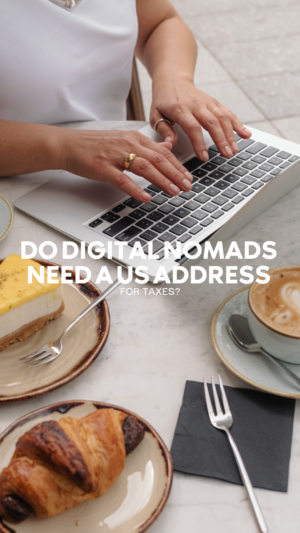 Woman typing on laptop with coffee and pastries