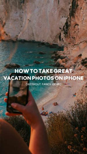 Person taking beach photo with smartphone at sunset