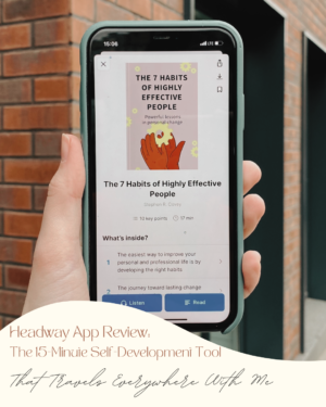 Person holding phone displaying ebook about self-improvement