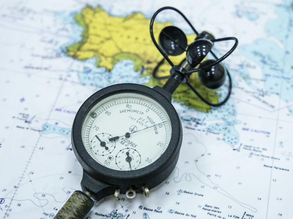 Anemometer on a nautical map highlighting maritime navigation