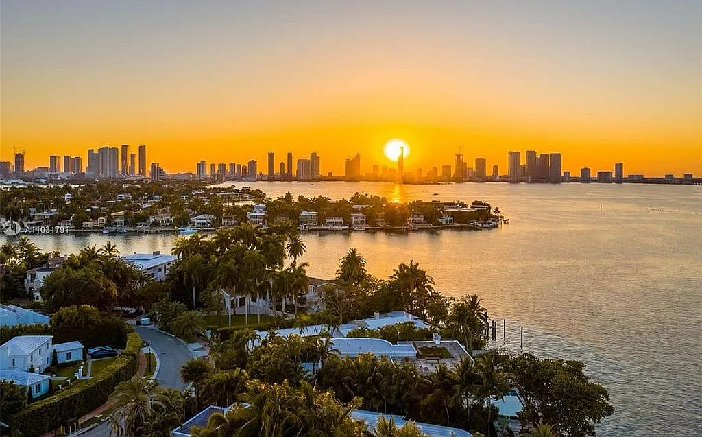 Sunset over Miami skyline and waterfront homes