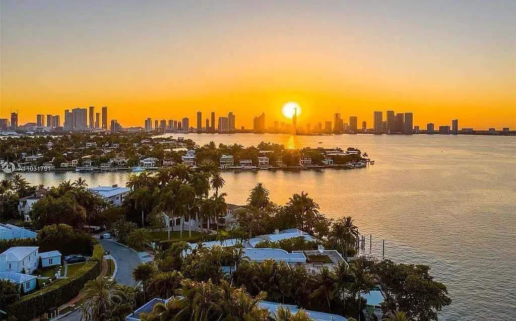 Sunset over Miami skyline and waterfront homes