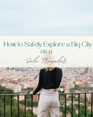 Woman overlooking cityscape from balcony, contemplating travel safety