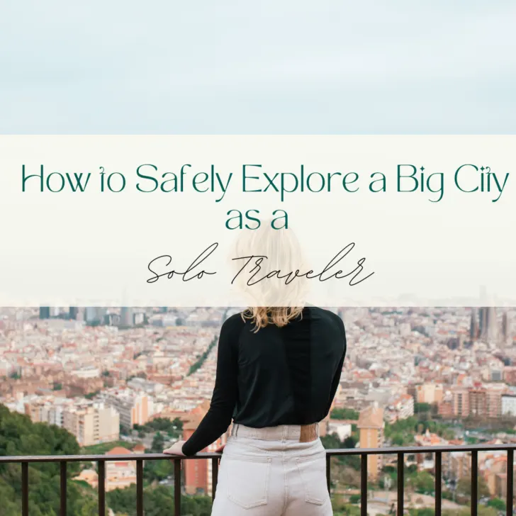 Woman overlooking cityscape from balcony, contemplating travel safety