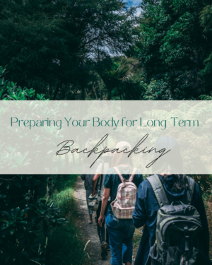 Hikers walking through lush forest preparing for backpacking
