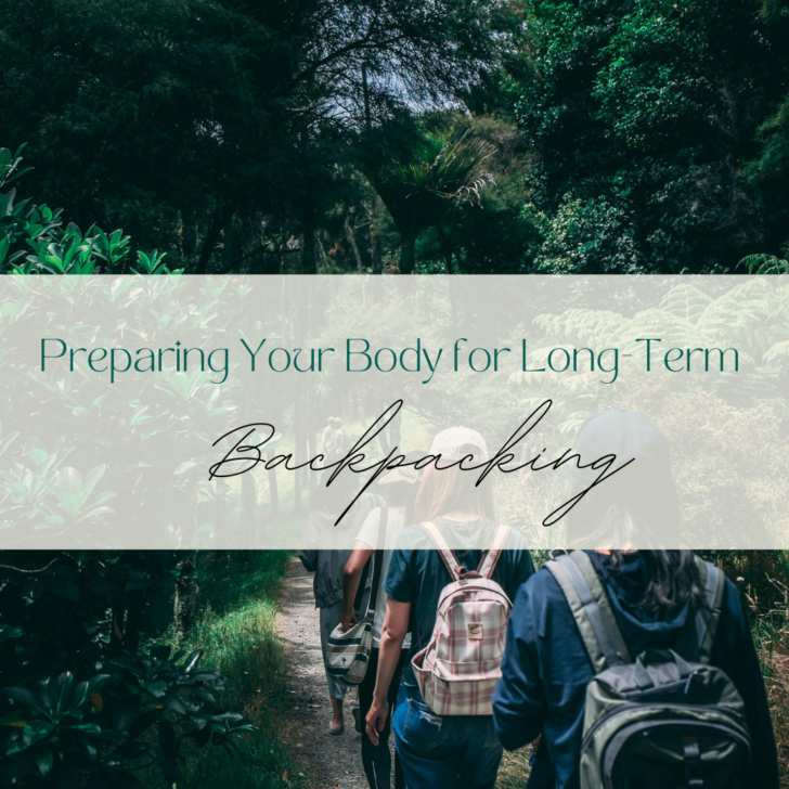 Hikers walking through lush forest preparing for backpacking