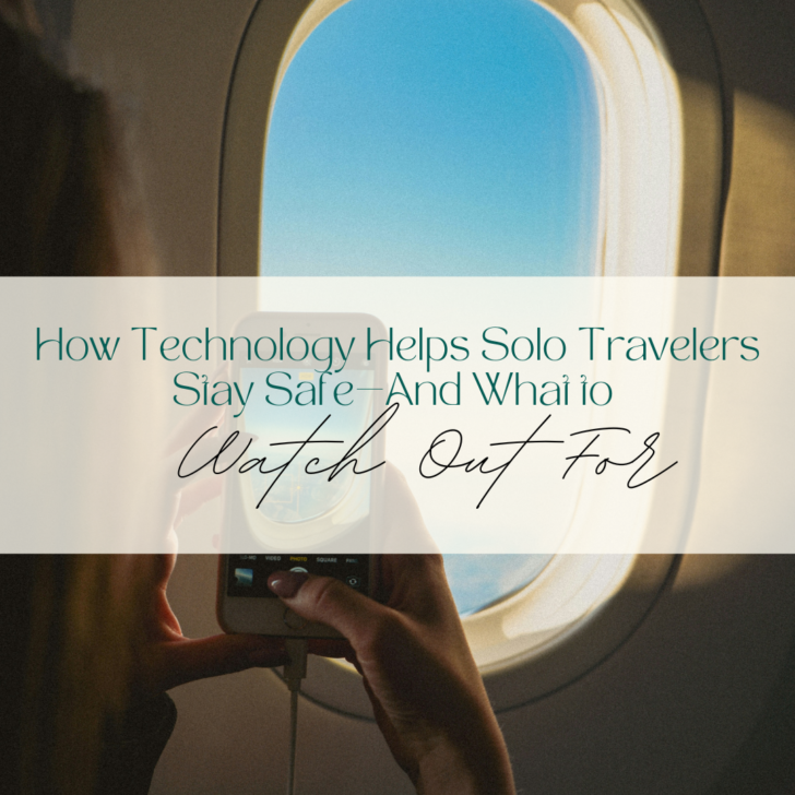 Person using smartphone by airplane window