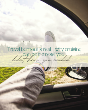 Leg out car window, shoe and countryside view.