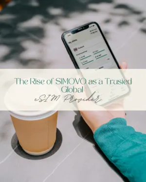 Person checking eSIM details on smartphone near coffee cup