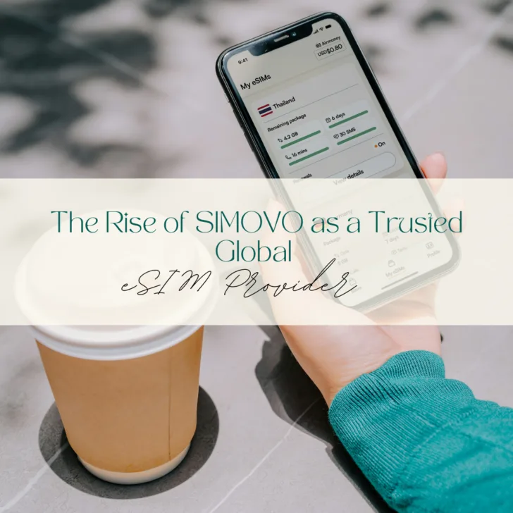 Person checking eSIM details on smartphone near coffee cup