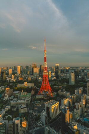 Tokyo Tower at sunset amidst cityscape